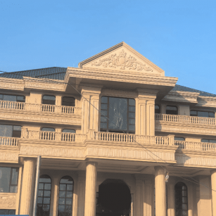 吉林市黄金麻别墅外墙干挂石材效果示例