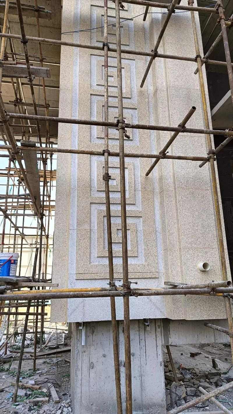 吉林市 黄金麻花岗岩别墅外墙干挂回纹造型效果