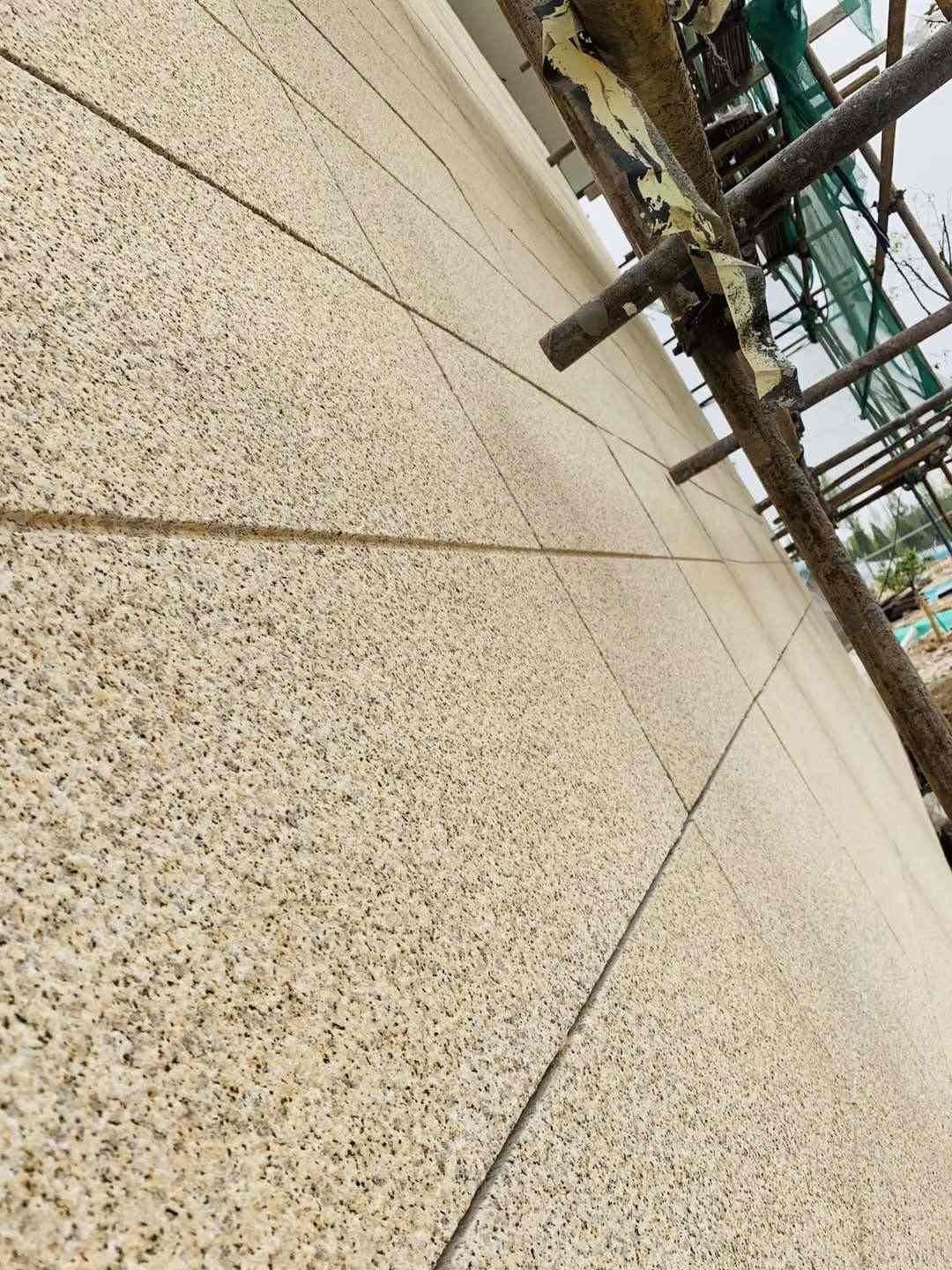 吉林市 黄金麻花岗岩荔枝面外墙干挂石材效果示例